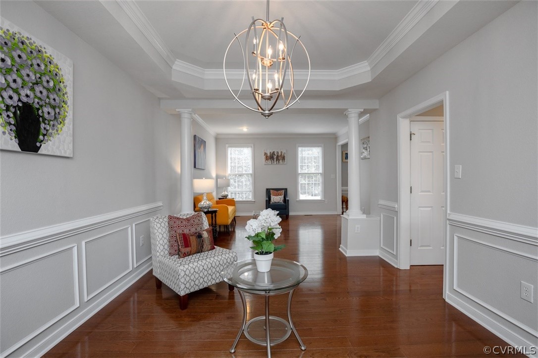5208 Wheat Ridge Place Glen Allen, VA 23059 - Photo 13 of 45 a living room with dining table and wooden floor