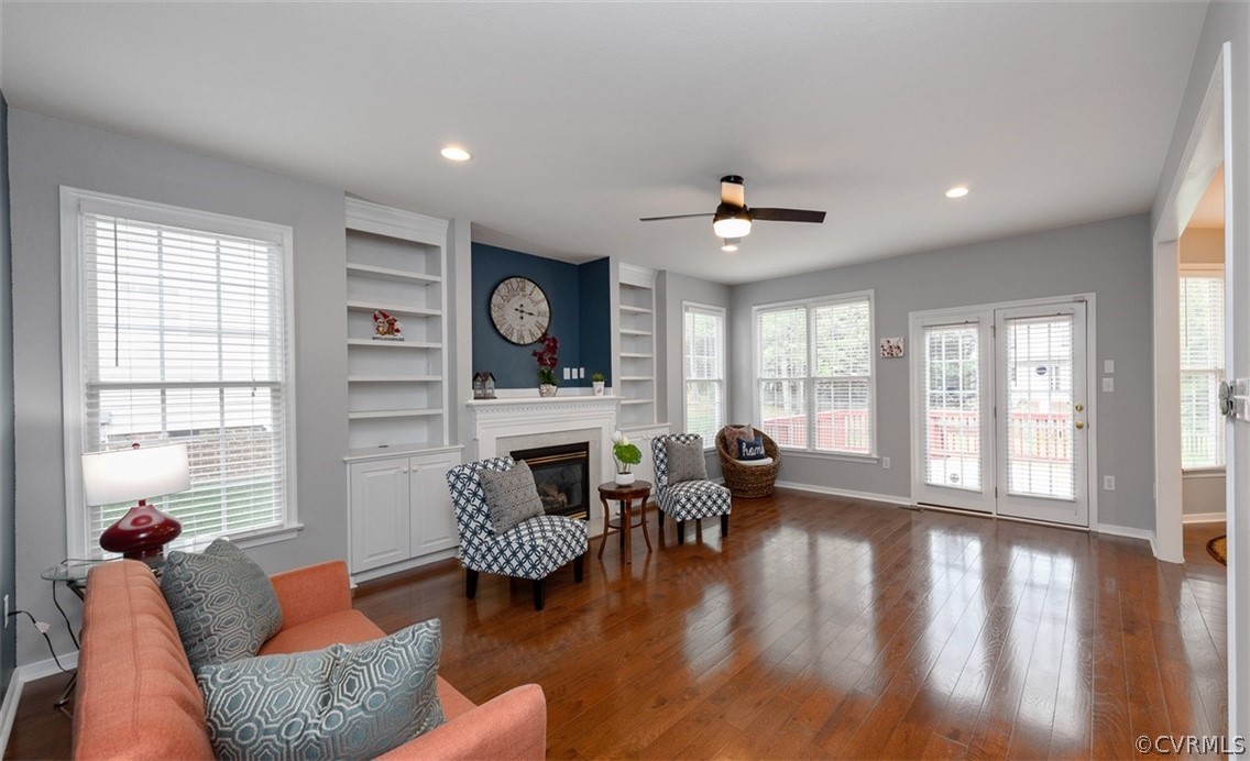 5208 Wheat Ridge Place Glen Allen, VA 23059 - Photo 17 of 45 a living room with furniture and a large window