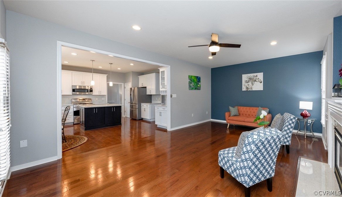 5208 Wheat Ridge Place Glen Allen, VA 23059 - Photo 19 of 45 a living room with furniture and kitchen view