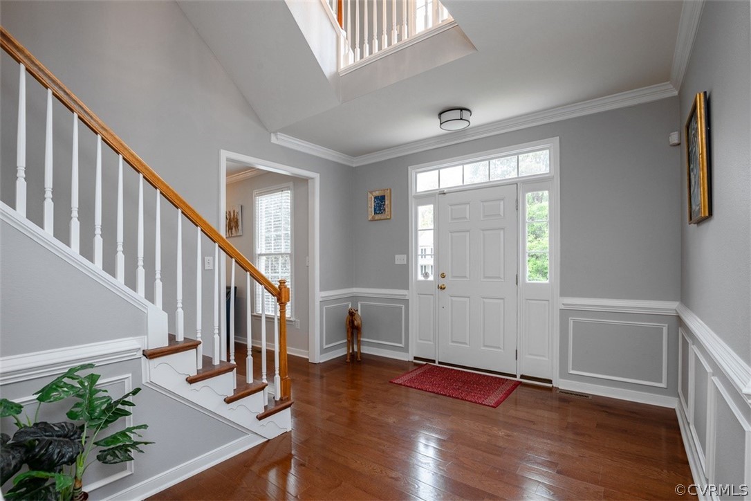 5208 Wheat Ridge Place Glen Allen, VA 23059 - Photo 21 of 45 a view of an entryway with wooden floor and stairs