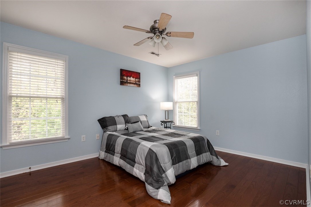 5208 Wheat Ridge Place Glen Allen, VA 23059 - Photo 26 of 45 a bedroom with a bed and window