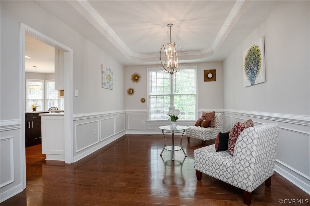 5208 Wheat Ridge Place Glen Allen, VA 23059 - Photo 9 of 45 a living room with furniture and a chandelier