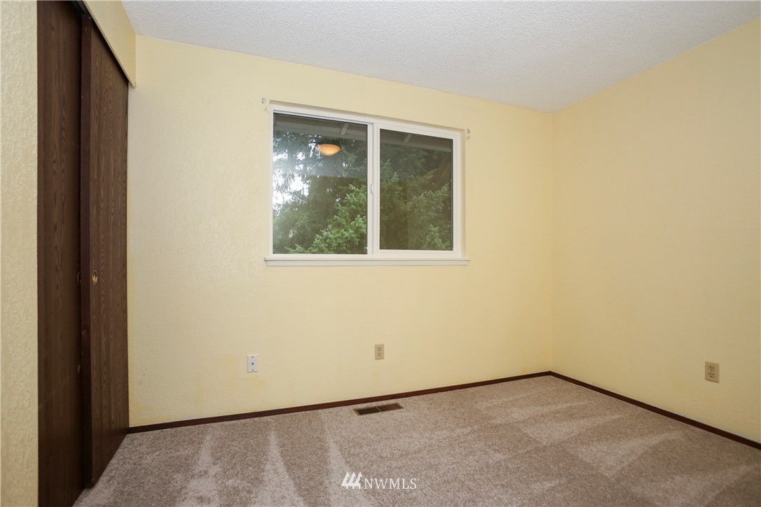 2521 173rd Place Southeast Bothell, WA 98012 - Photo 11 of 21 an empty room with a window