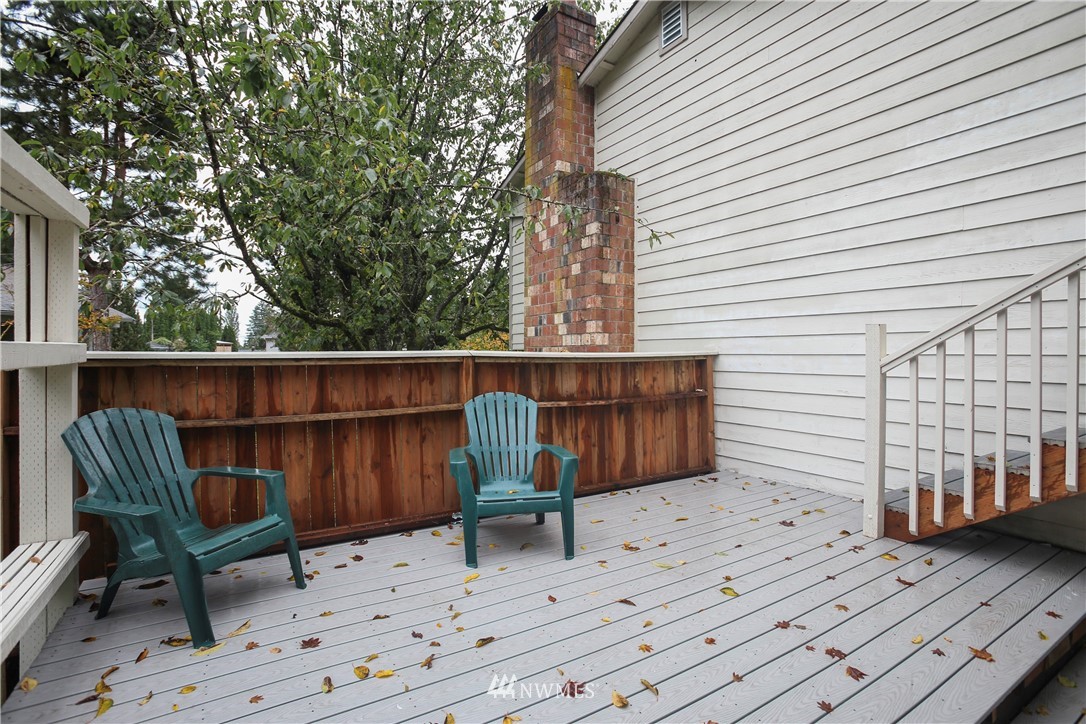 2521 173rd Place Southeast Bothell, WA 98012 - Photo 18 of 21 a view of a chairs on the deck