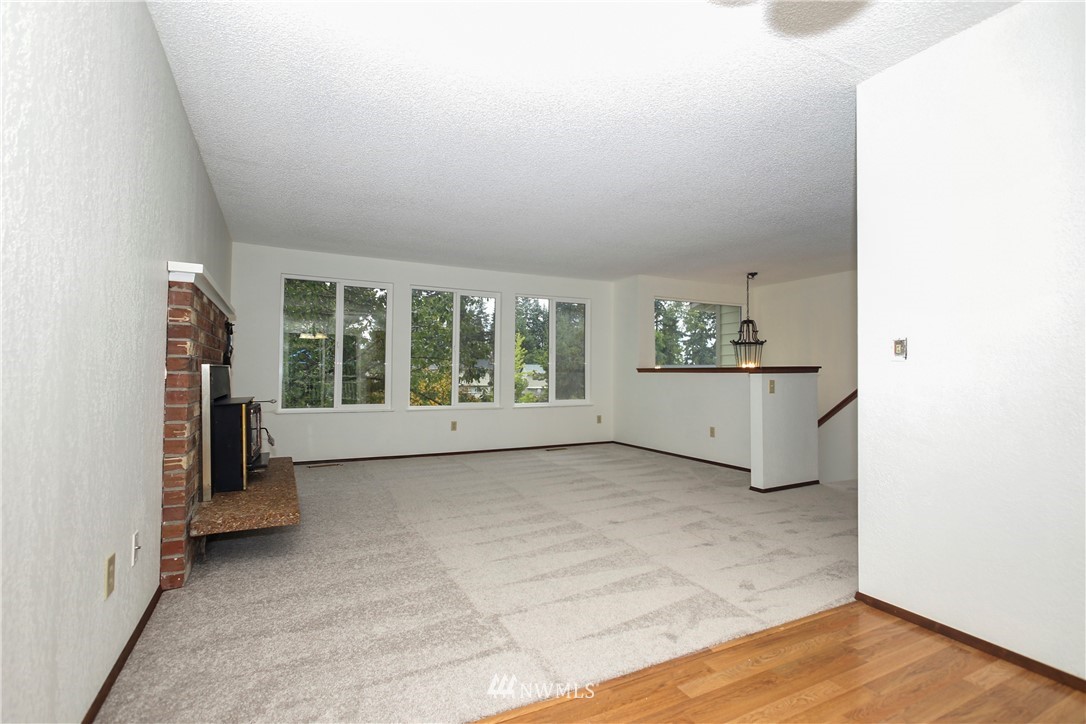 2521 173rd Place Southeast Bothell, WA 98012 - Photo 5 of 21 a view of an empty room with a window