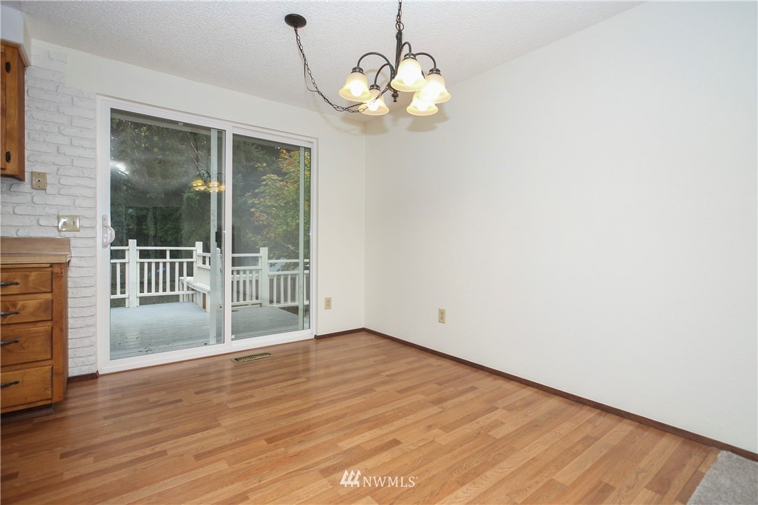2521 173rd Place Southeast Bothell, WA 98012 - Photo 6 of 21 a view of a livingroom with wooden floor