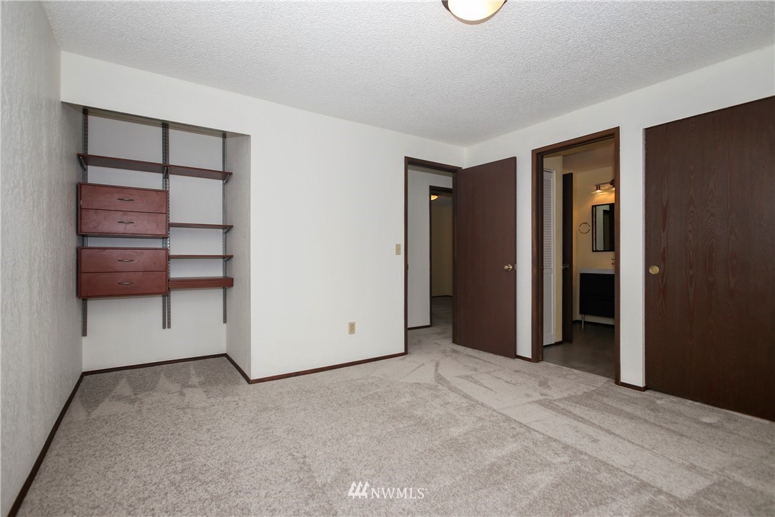 2521 173rd Place Southeast Bothell, WA 98012 - Photo 9 of 21 a view of an empty room with closet and a window