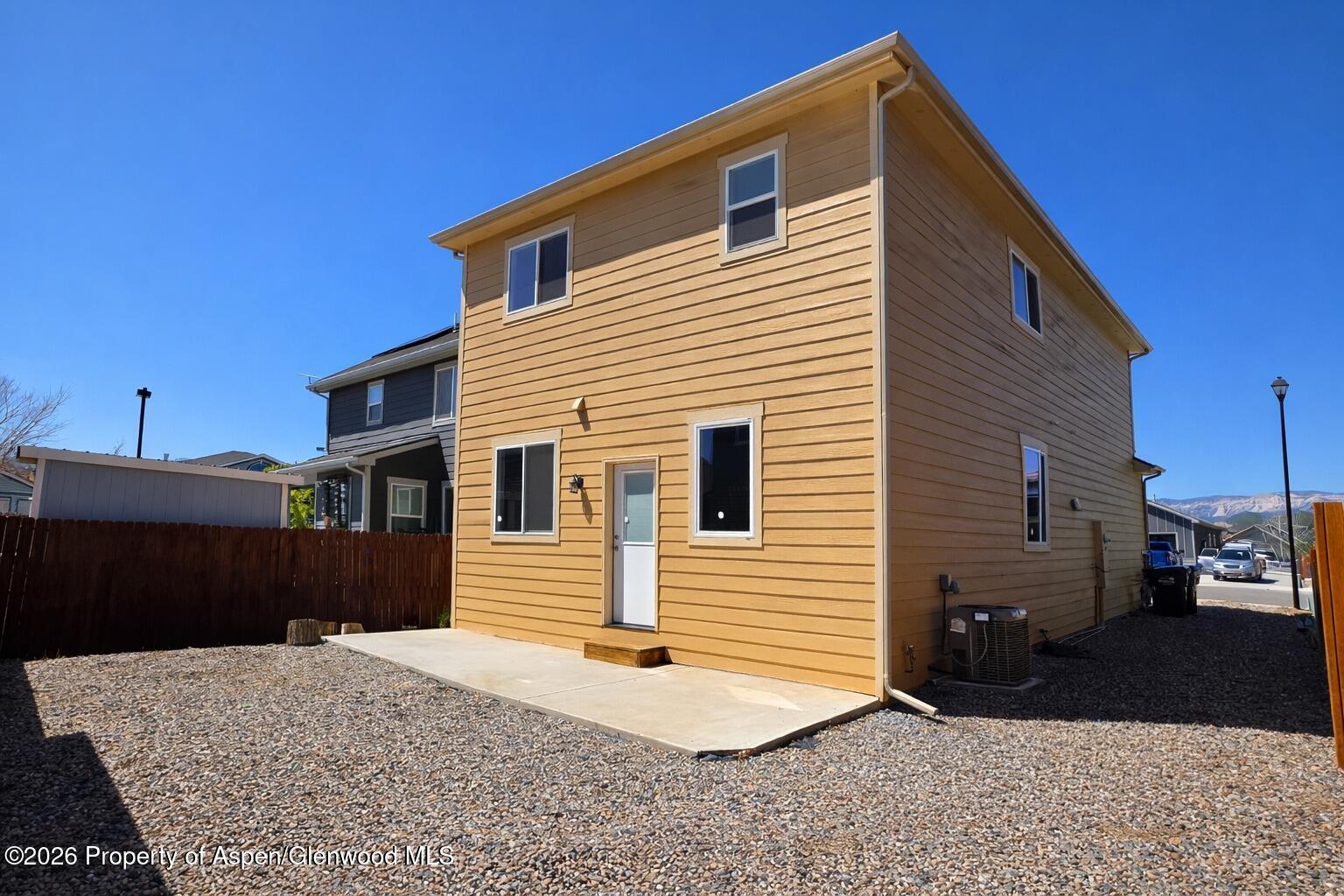 1648 Arabian Avenue Rifle, CO 81650 - Photo 15 of 15 a front view of a house with a yard