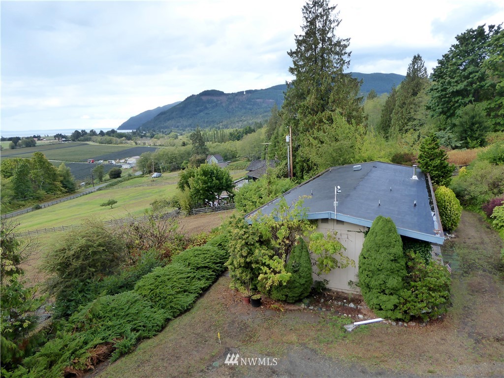 16084 Tulip Lane Bow, WA 98232 - Photo 4 of 8 an aerial view of a house with yard and green space