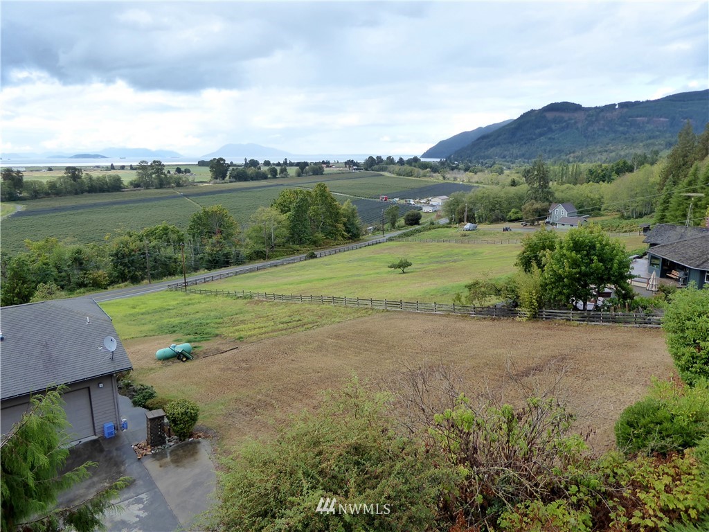 16084 Tulip Lane Bow, WA 98232 - Photo 5 of 8 an aerial view of a house with outdoor space
