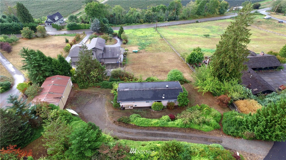 16084 Tulip Lane Bow, WA 98232 - Photo 8 of 8 an aerial view of a house with outdoor space and lake view