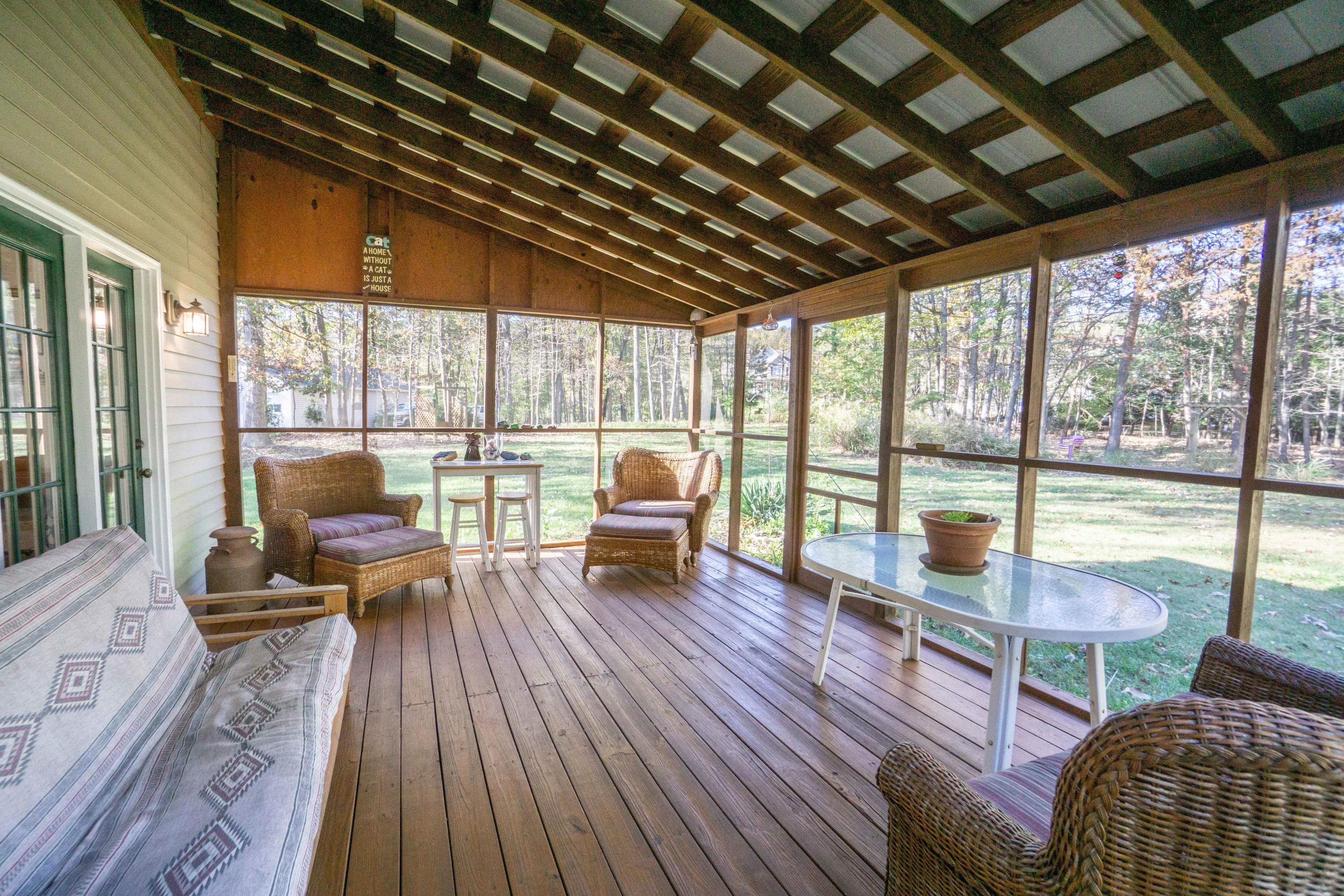 218 Oak Ridge Court Blue Ridge, VA 24064 - Photo 21 of 48 a living room with furniture and a large window