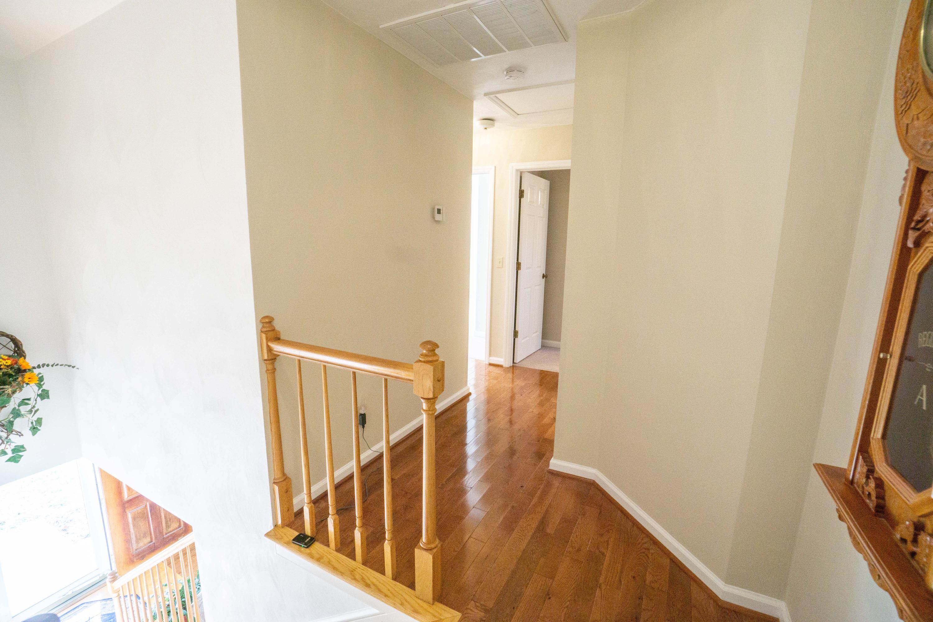 218 Oak Ridge Court Blue Ridge, VA 24064 - Photo 29 of 48 a view of a hallway with staircase