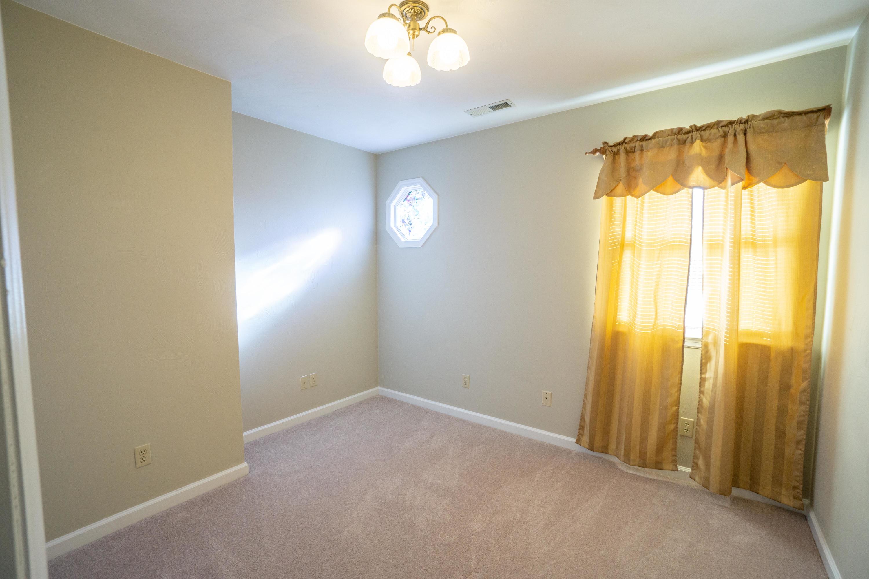 218 Oak Ridge Court Blue Ridge, VA 24064 - Photo 36 of 48 a view of an empty room with a window