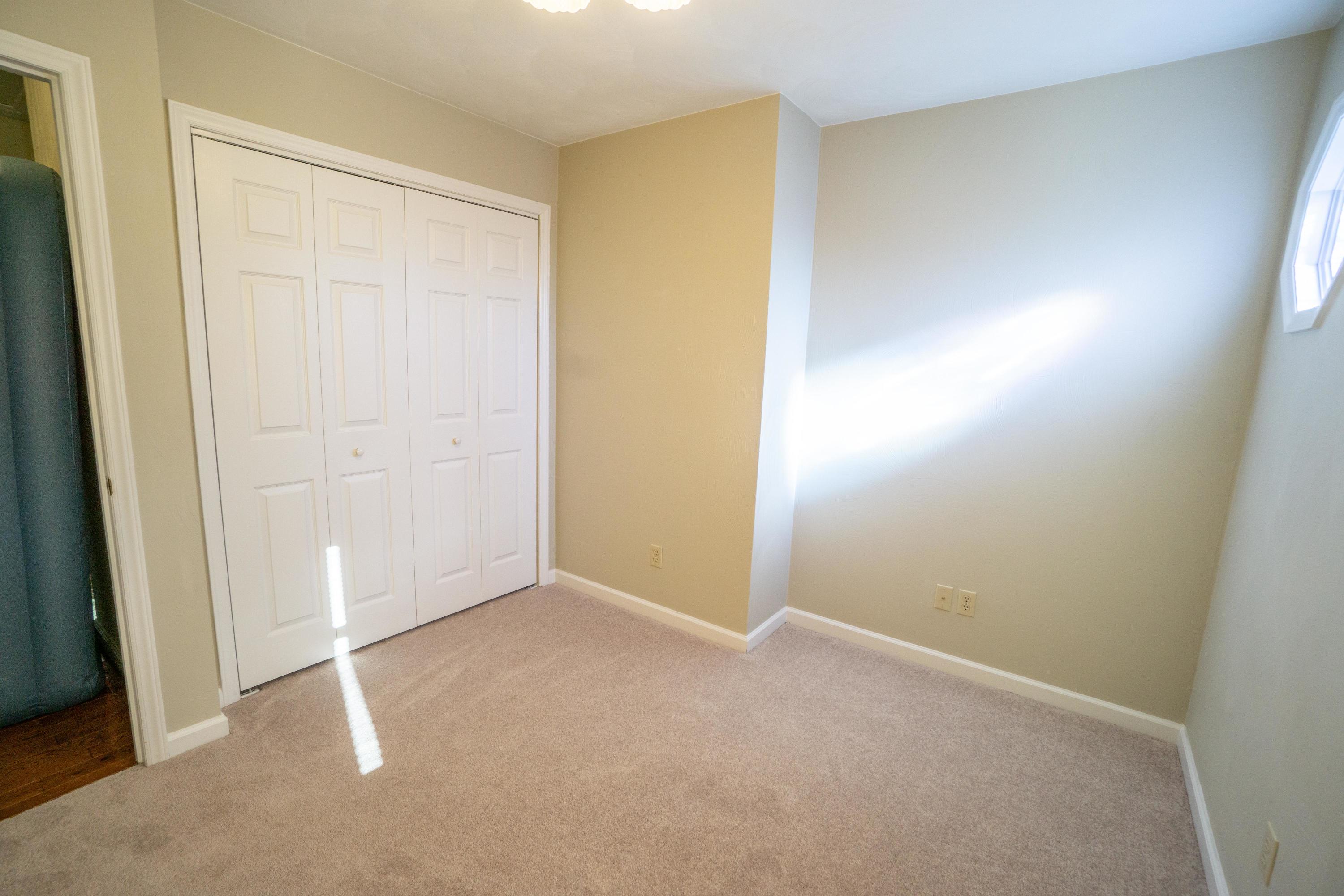218 Oak Ridge Court Blue Ridge, VA 24064 - Photo 37 of 48 an empty room with closet area