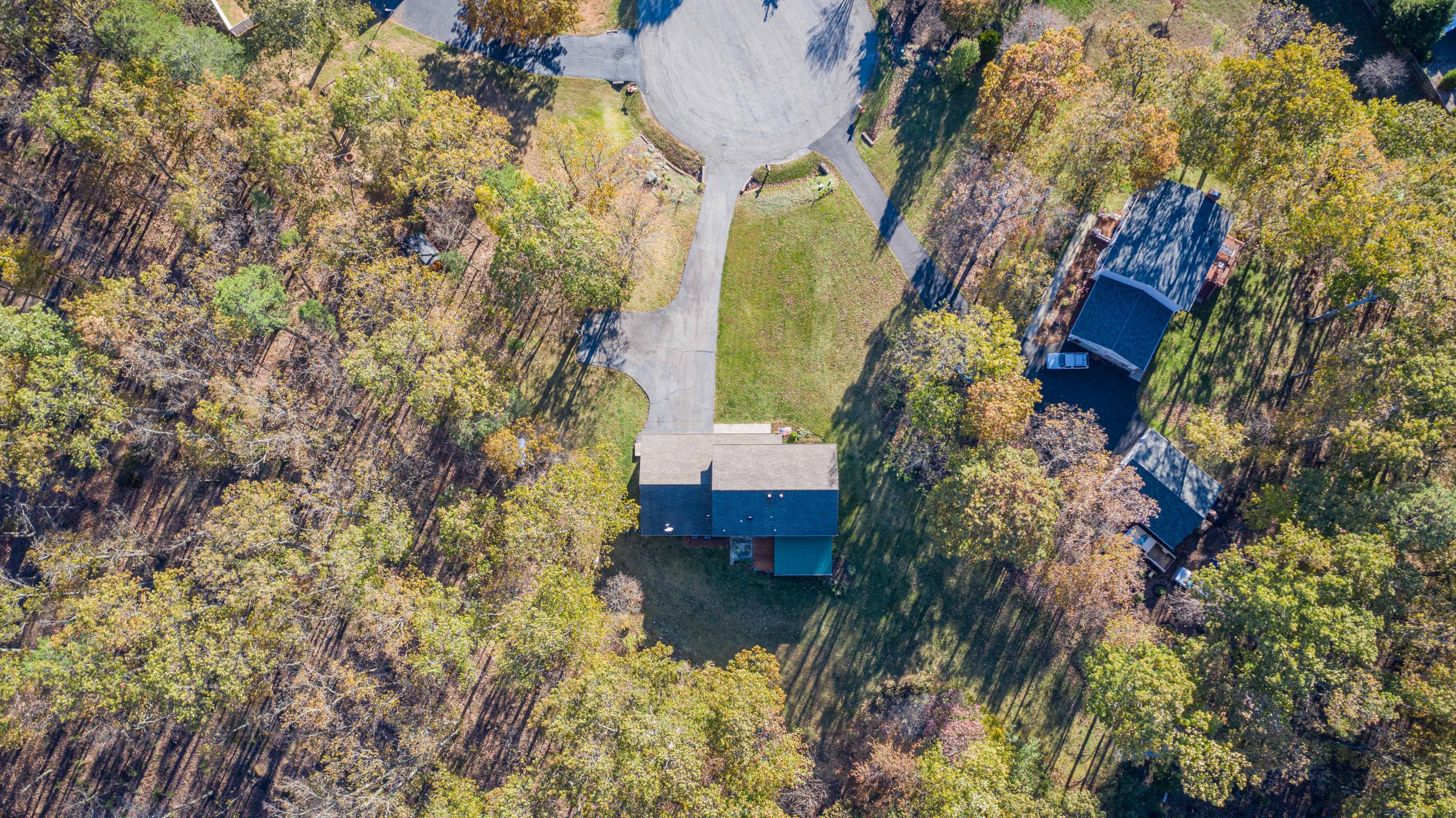 218 Oak Ridge Court Blue Ridge, VA 24064 - Photo 47 of 48 a view of a house with a yard