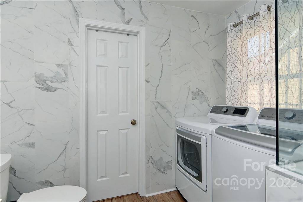 1421 Autumn Ridge Lane Fort Mill, SC 29708 - Photo 21 of 48 a bathroom with a sink a toilet and shower
