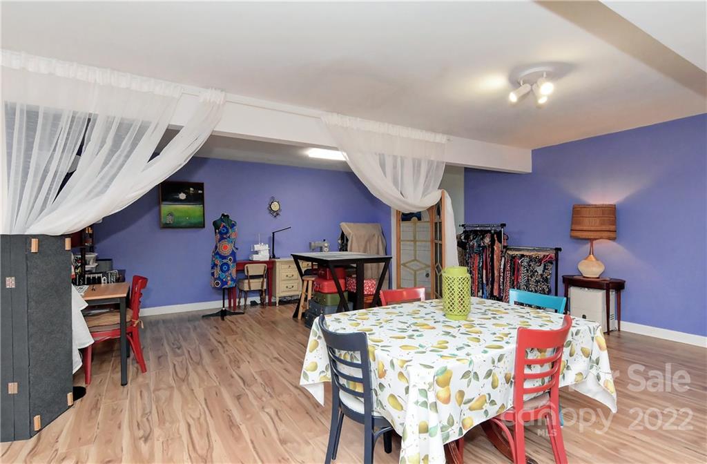 1421 Autumn Ridge Lane Fort Mill, SC 29708 - Photo 28 of 48 a view of a dining room with furniture and wooden floor