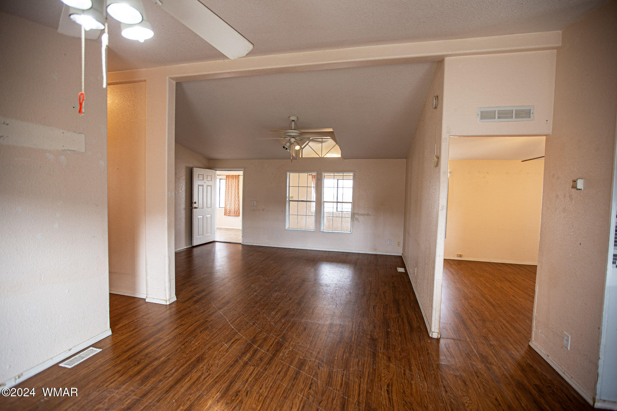 748 West School Bus Road Eagar, AZ 85925 - Photo 8 of 26 Dining Room looking towards Primary Bedroom and Living Room