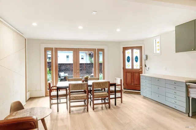 a room with furniture and wooden floor