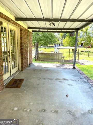 a view of a room with a large window