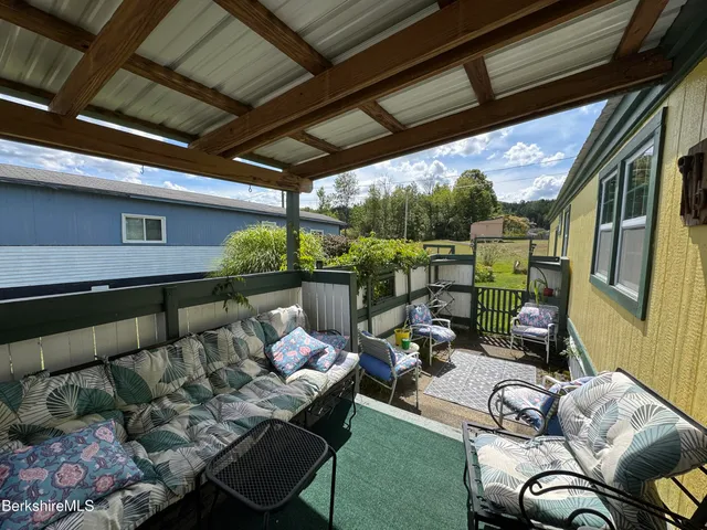 a outdoor living space with furniture