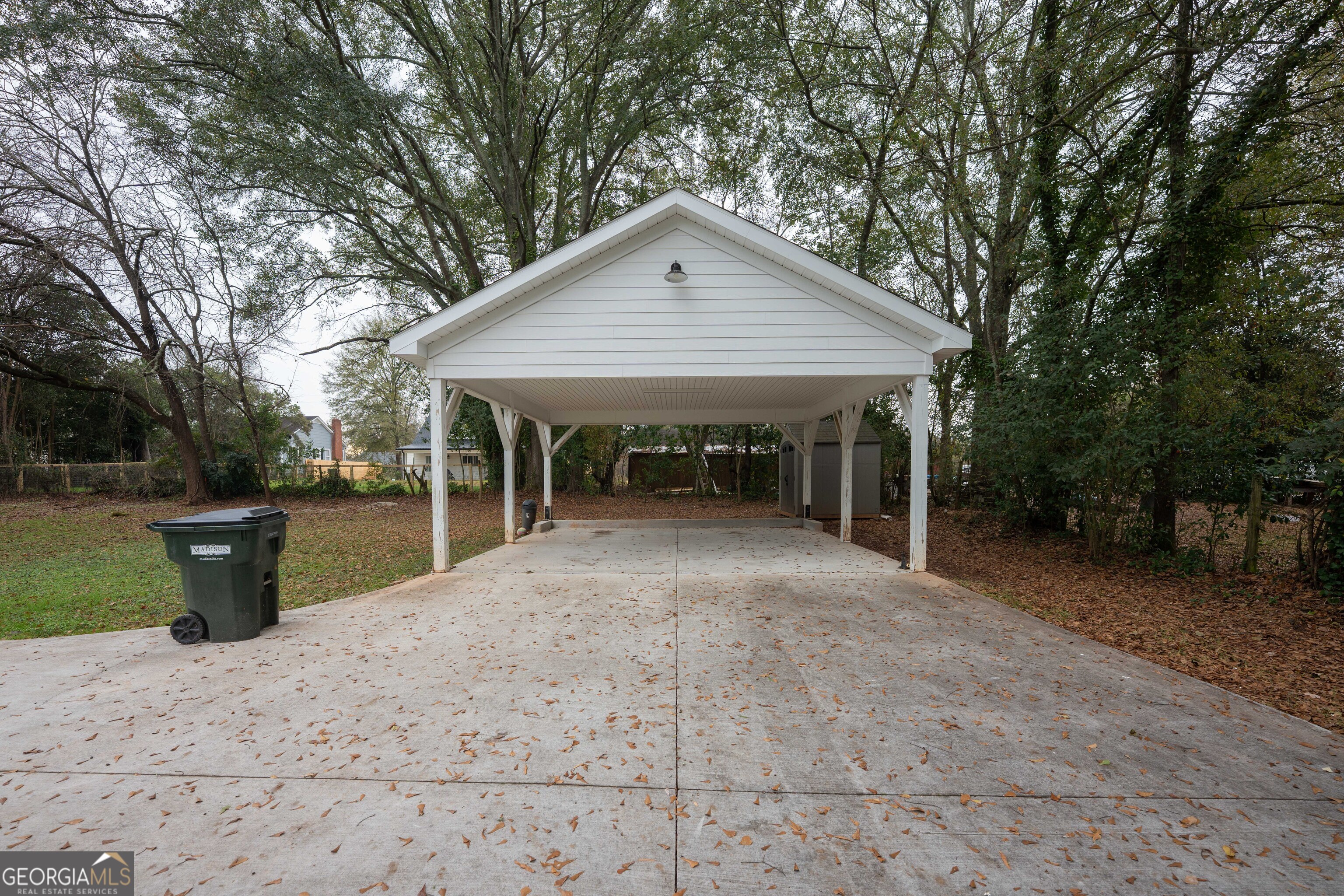 1020 Bell Circle Madison, GA 30650 - Photo 17 of 17 a view of a house with backyard and garden