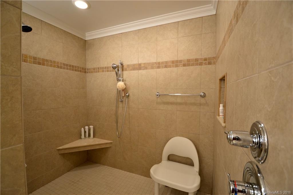 409 Willow Road Salisbury, NC 28147 - Photo 22 of 34 a bathroom with a sink mirror and toilet