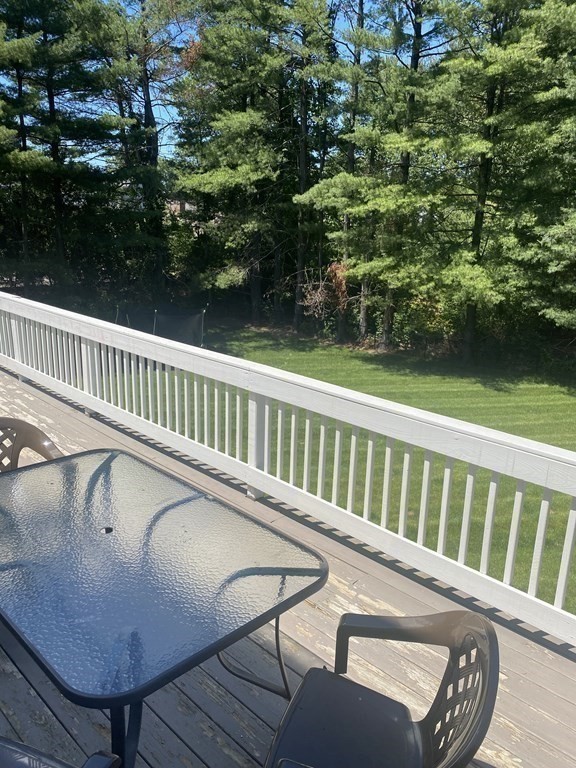 88 Fair Oak Road Springfield, MA 01128 - Photo 8 of 34 a view of a chair and table in the balcony