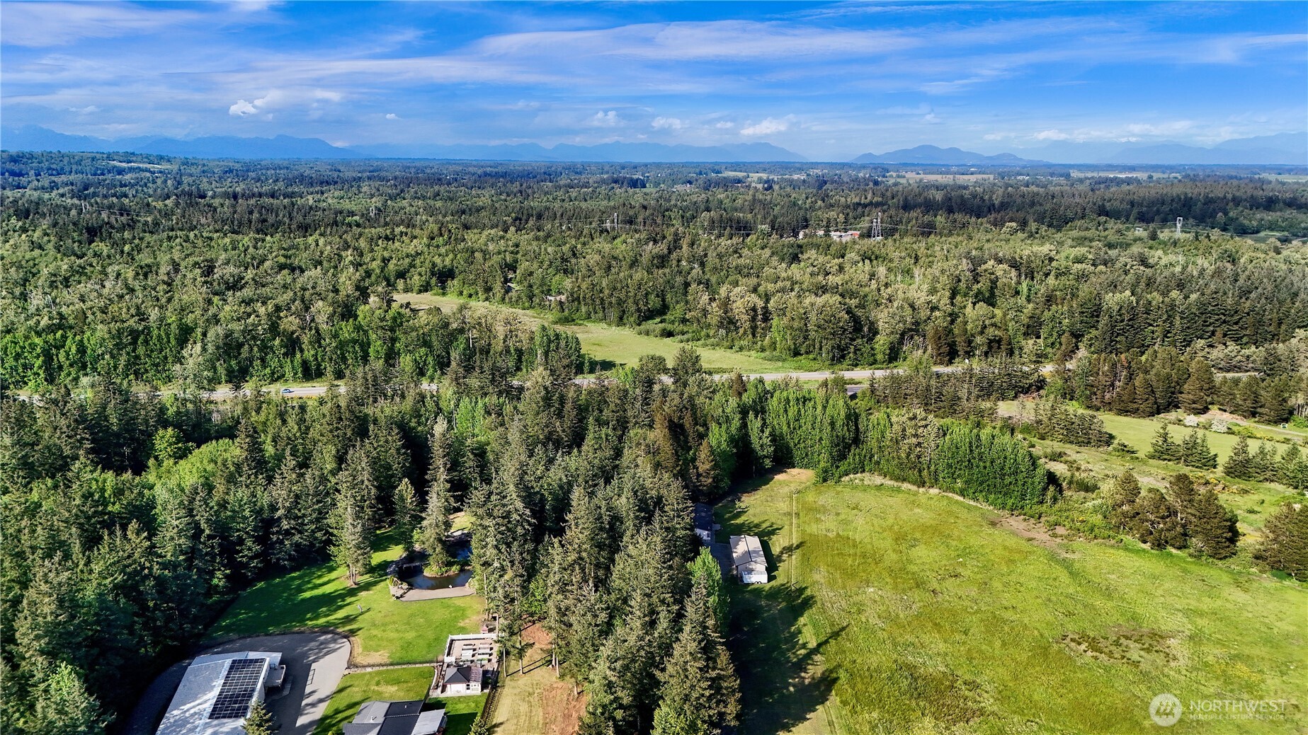 7928 Portal Way Custer, WA 98240 - Photo 36 of 39 a view of a city with lush green forest