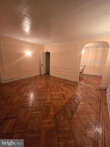 a view of a big room with a wooden floor