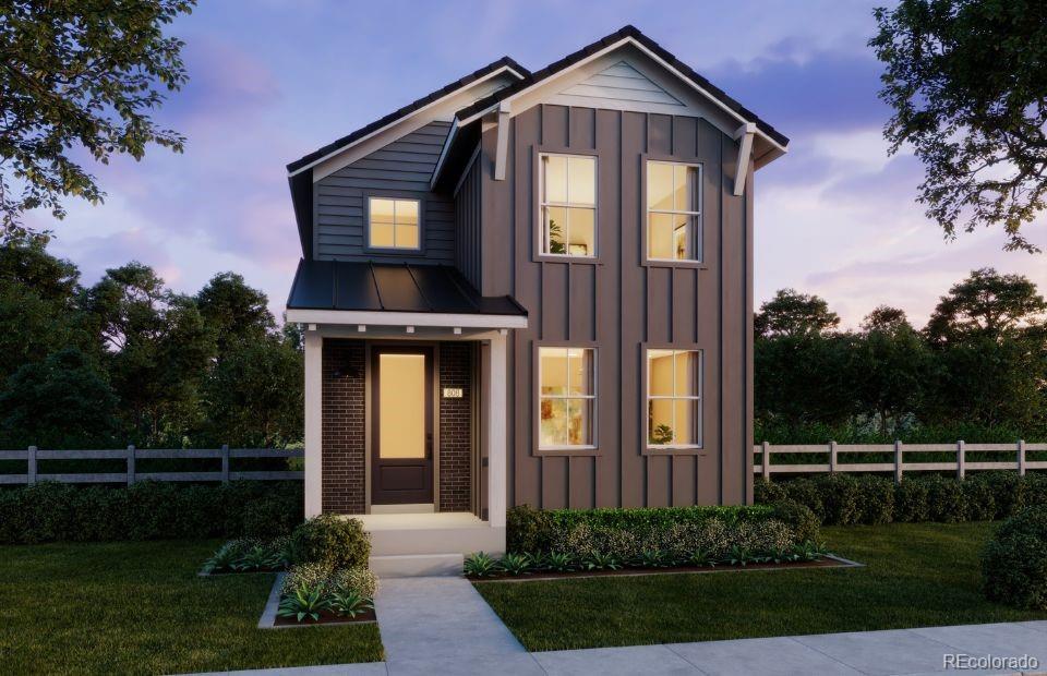 7336 Watercress Drive Littleton, CO 80125 - Photo 1 of 1 a front view of a house with garden