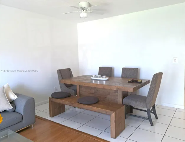 a view of room with wooden floor