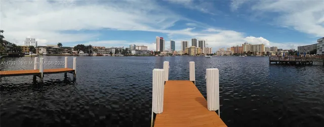 a view of balcony with a swimming pool