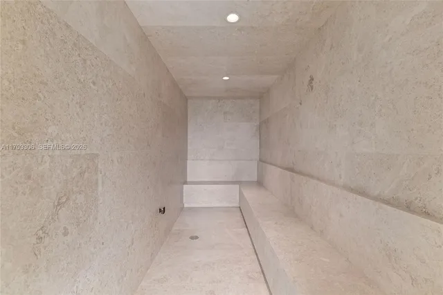 a view of a patio with couches table and chairs and potted plants