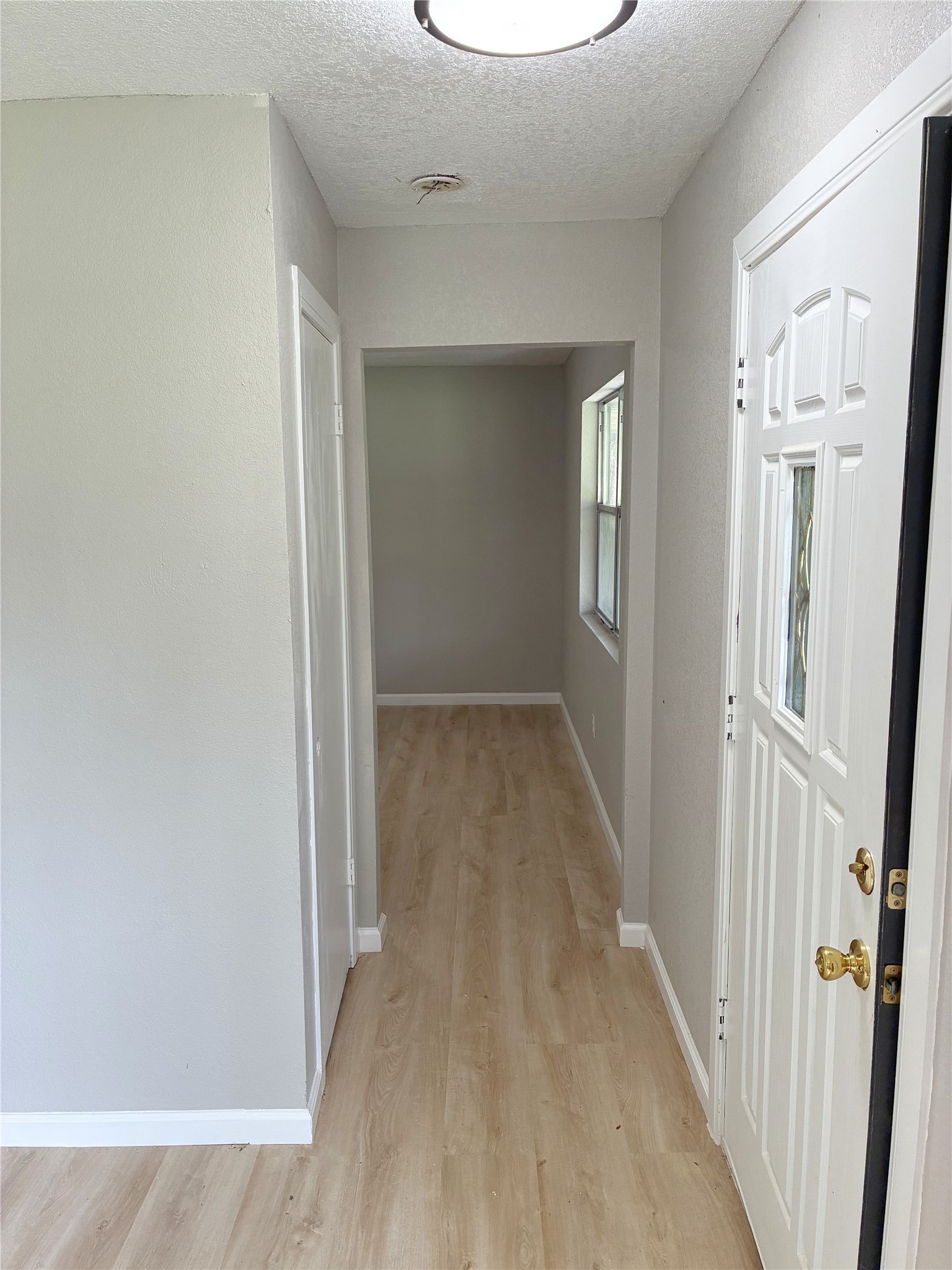 117 Amanda Street Conroe, TX 77304 - Photo 9 of 35 wooden floor in a gallery