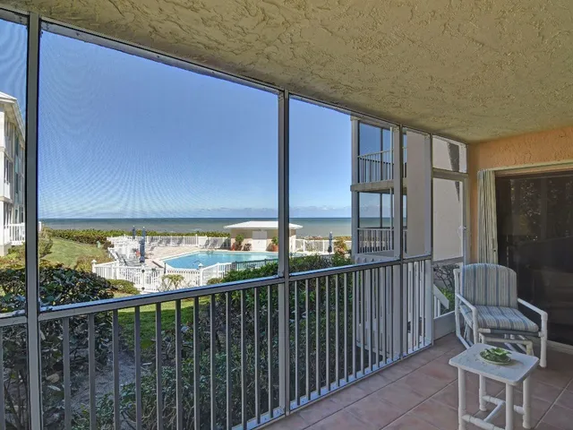 a view of a balcony with chair