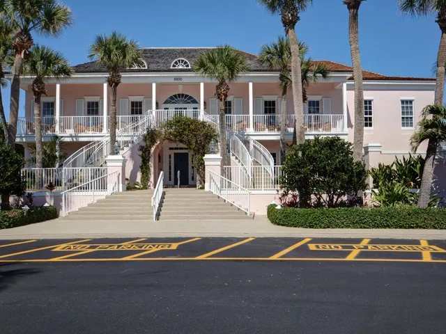 a view of a house with a street
