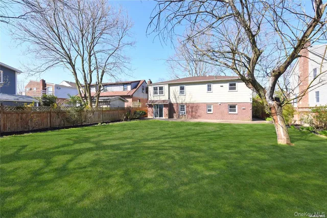 a view of a house with a back yard
