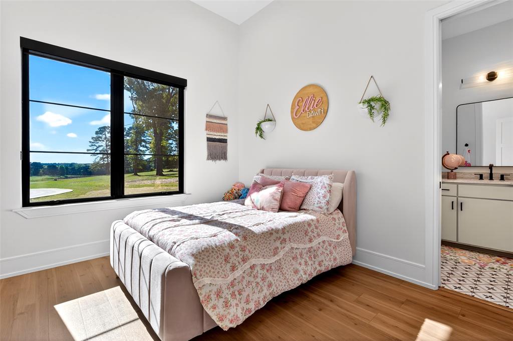 2804 Buchanan Road Hallsville, TX 75650 - Photo 26 of 40 a bedroom with a bed and a window