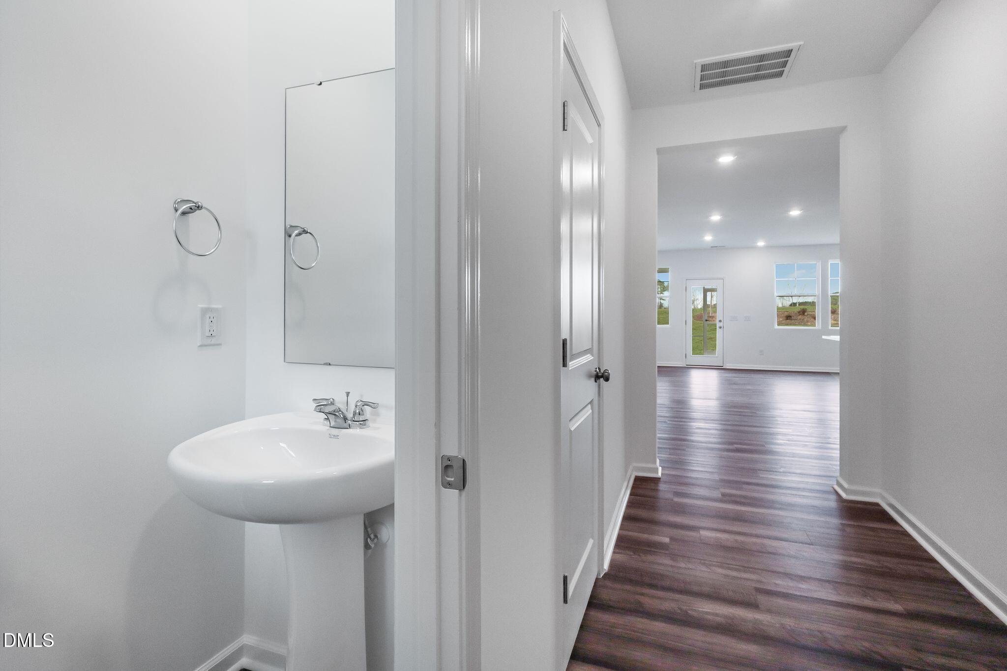 2939 Hickory Fld Drive Raleigh, NC 27616 - Photo 15 of 30 a bathroom with a sink and mirror