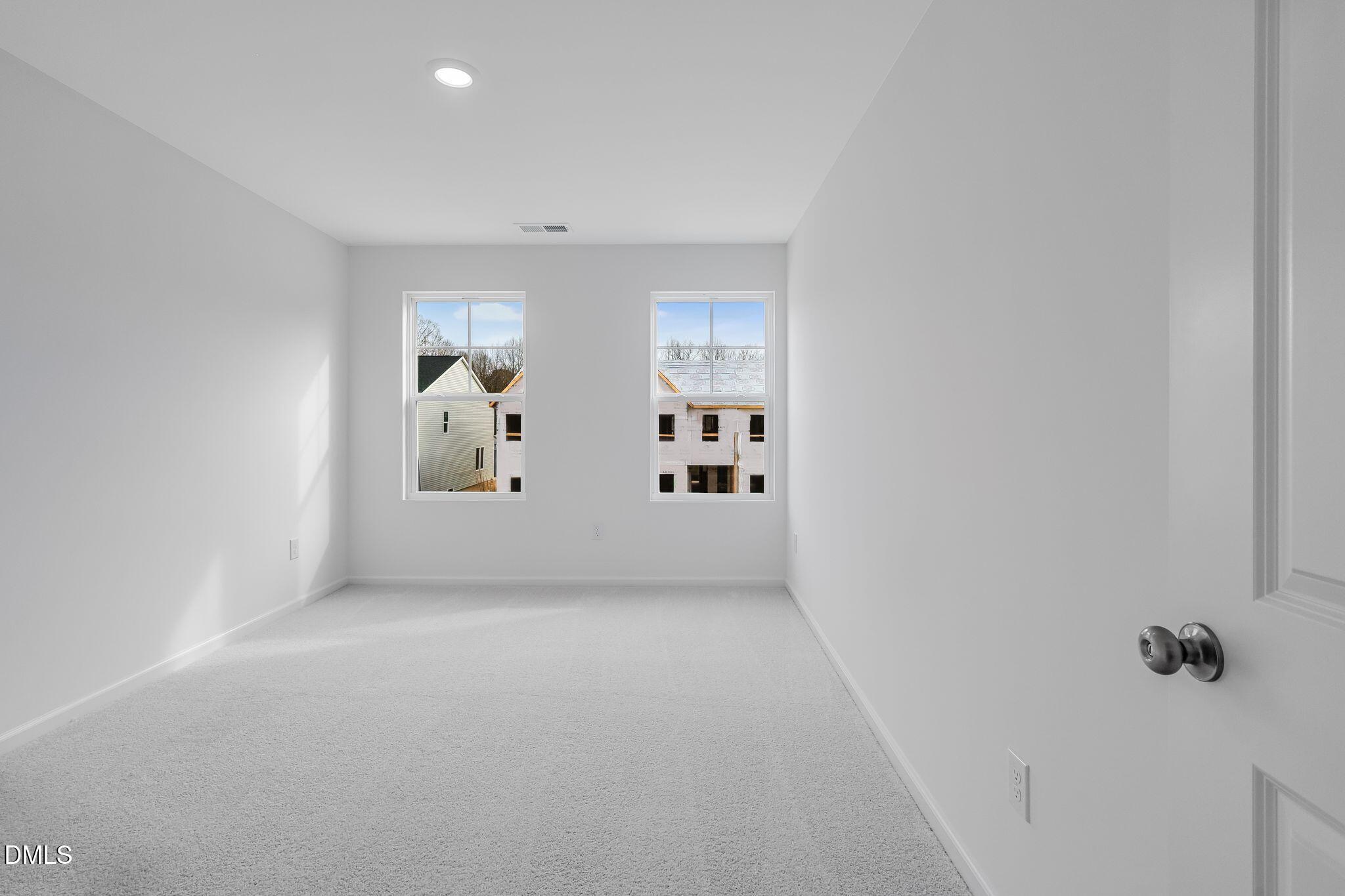 2939 Hickory Fld Drive Raleigh, NC 27616 - Photo 18 of 30 a view of a big room with closet and cabinet