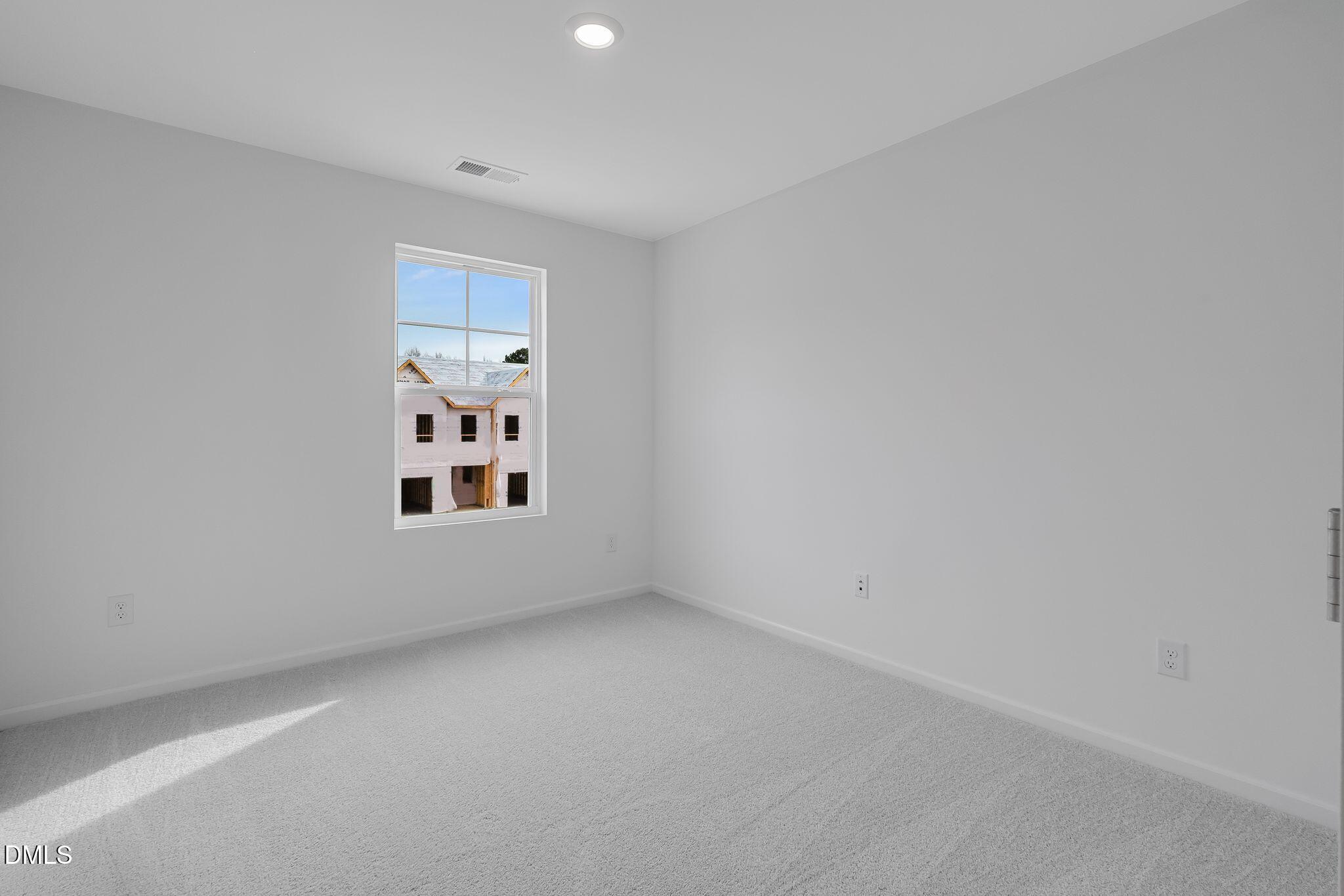 2939 Hickory Fld Drive Raleigh, NC 27616 - Photo 19 of 30 a view of a big room with window