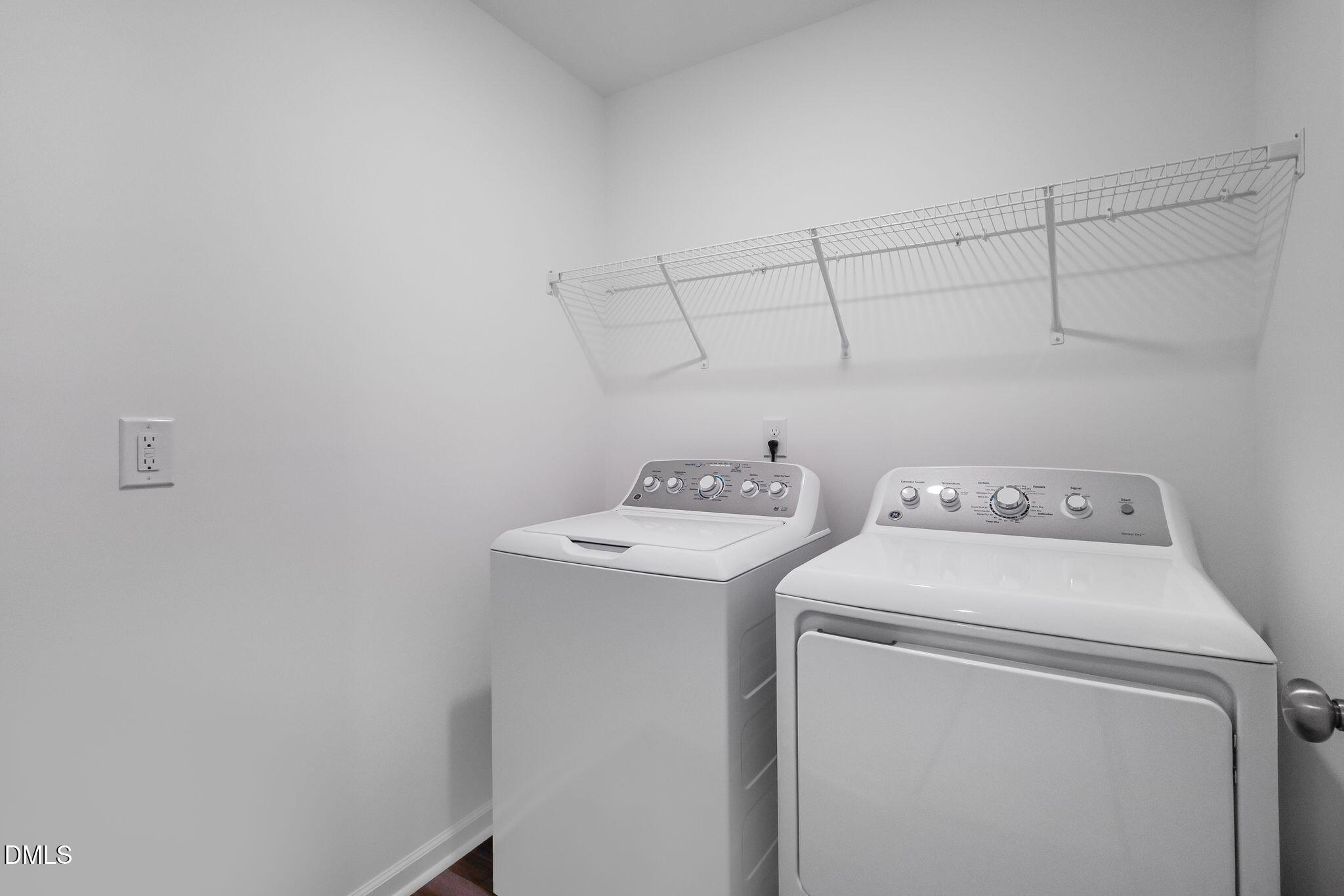 2939 Hickory Fld Drive Raleigh, NC 27616 - Photo 27 of 30 a view of storage and utility room with washer and dryer