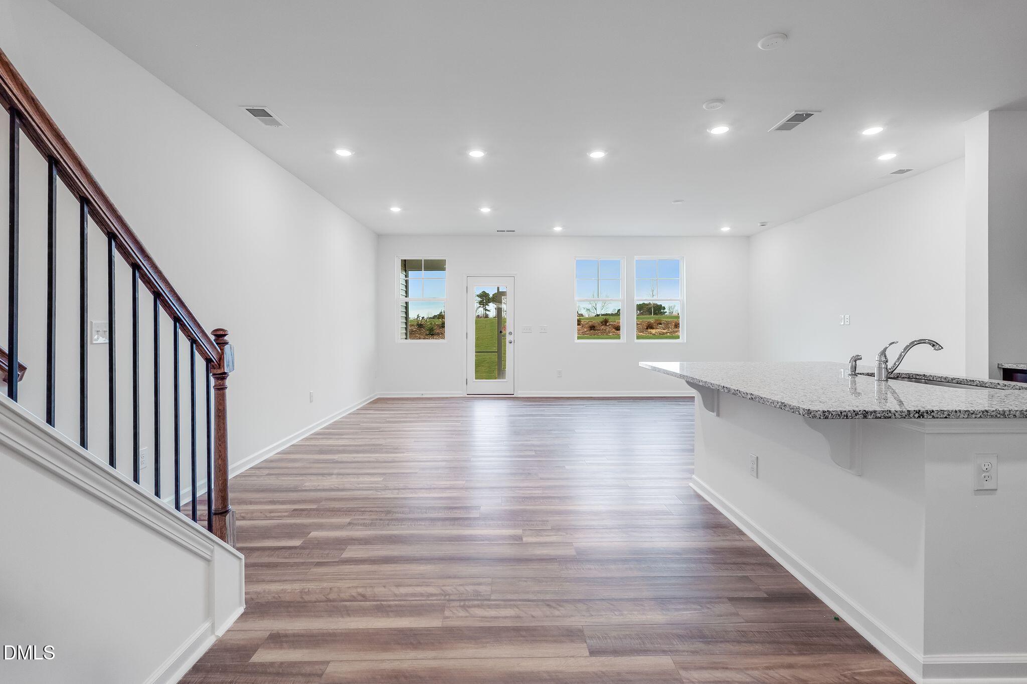 2939 Hickory Fld Drive Raleigh, NC 27616 - Photo 4 of 30 a view of kitchen with sink and wooden floor