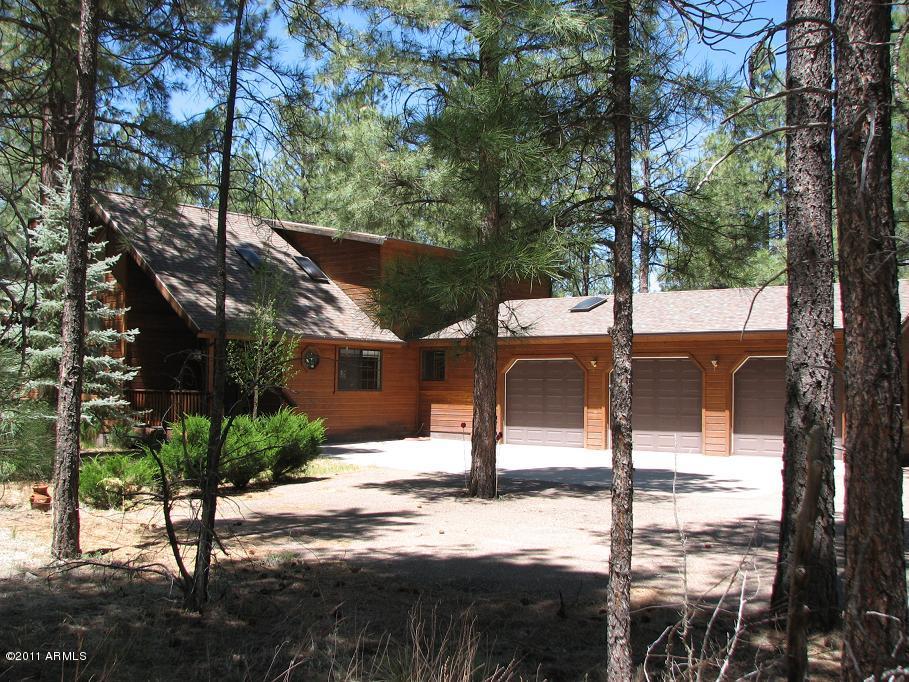 2935 Deer Hill Road Heber, AZ 85928 - Photo 1 of 14 a view of a yard and tree s
