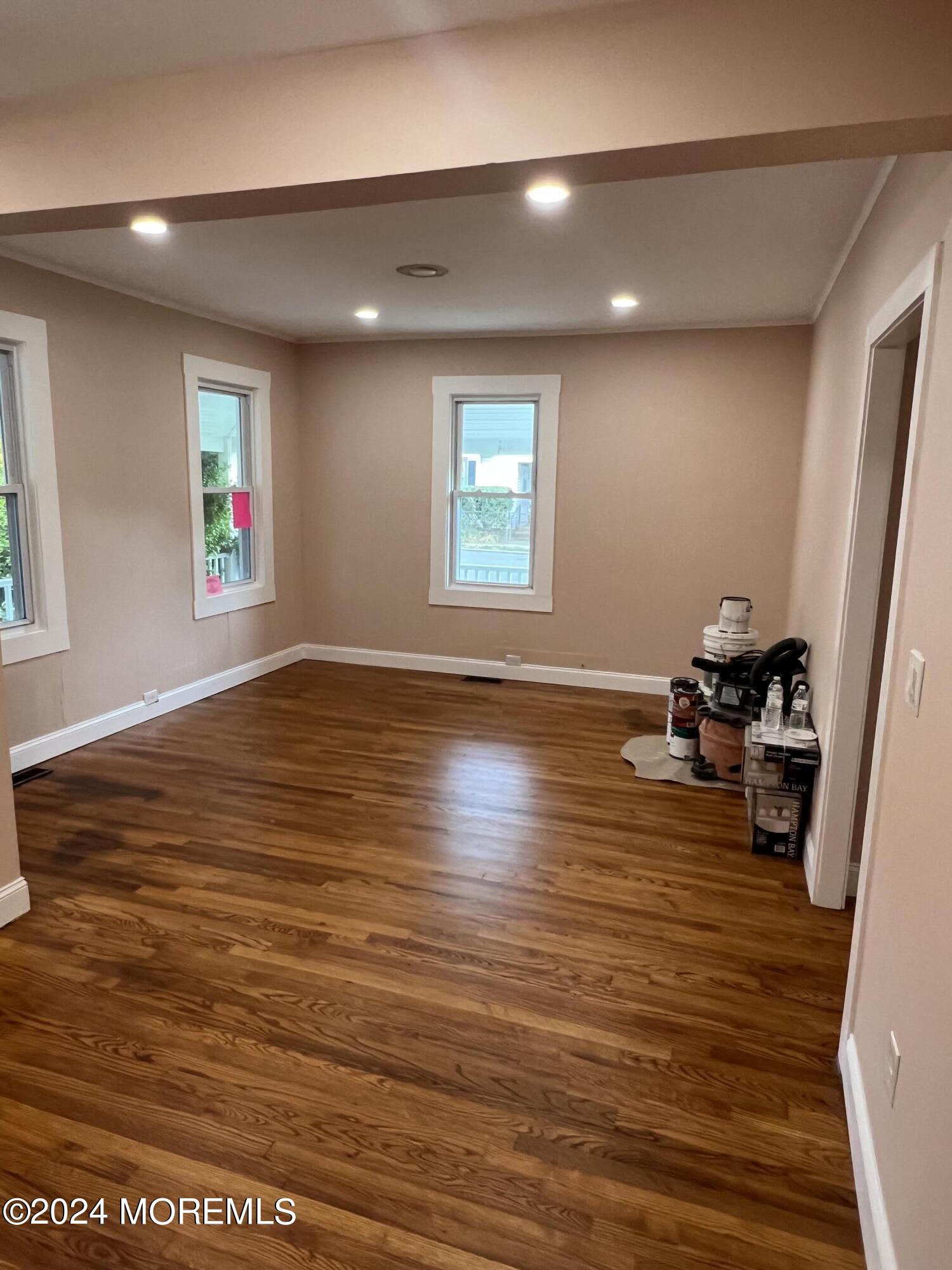 815 Clark Street, Unit 1 Point Pleasant, NJ 08742 - Photo 2 of 10 a view of a room window and wooden floor