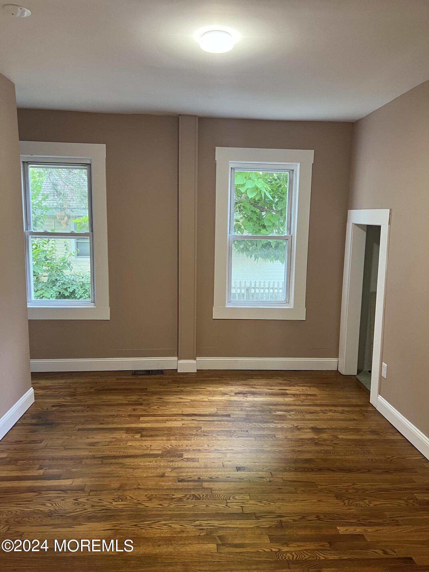 815 Clark Street, Unit 1 Point Pleasant, NJ 08742 - Photo 6 of 10 a view of an empty room with window