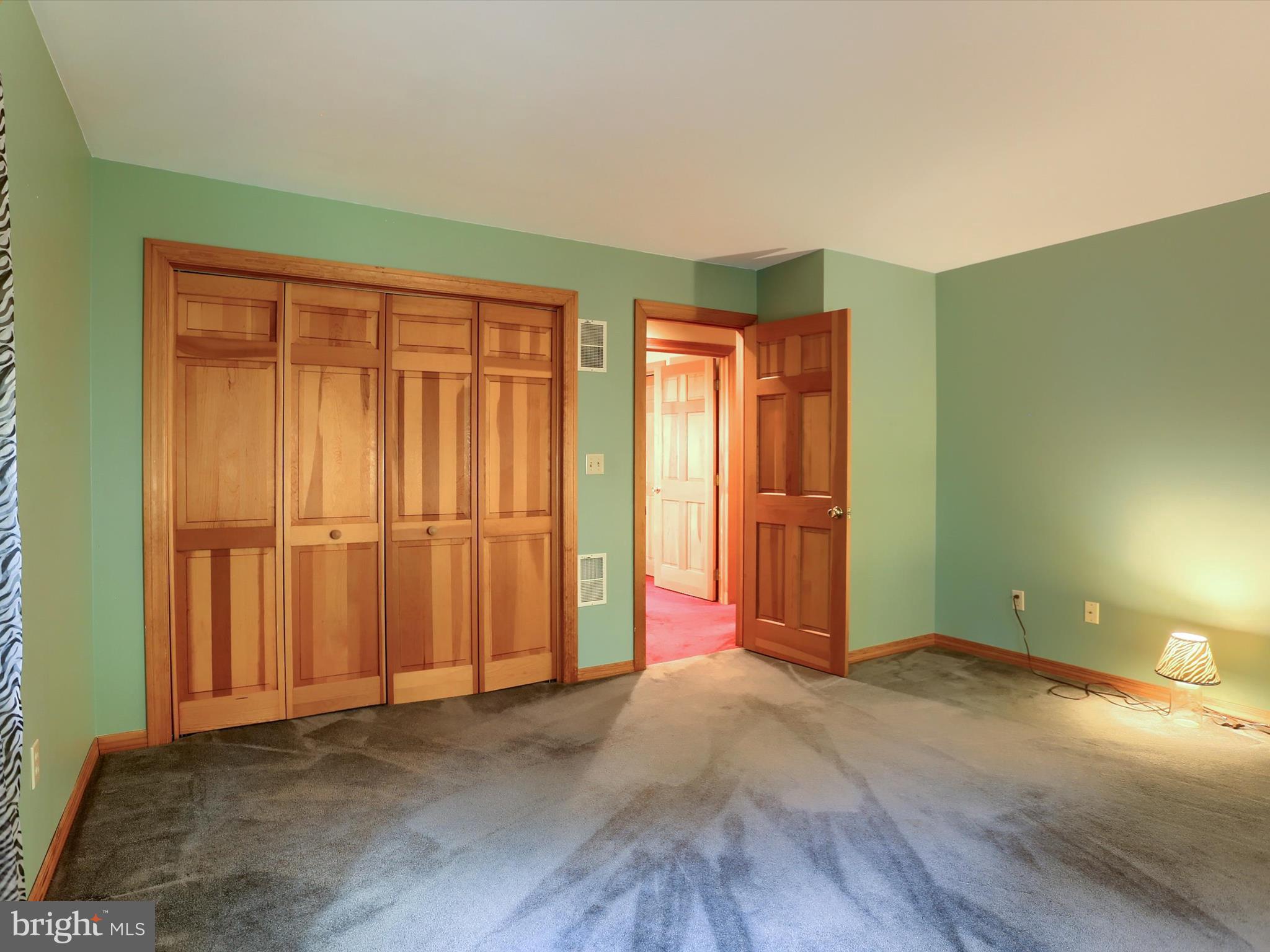 333 Mauger Path Road Port Royal, PA 17082 - Photo 26 of 58 an empty room with wooden floor and closet area