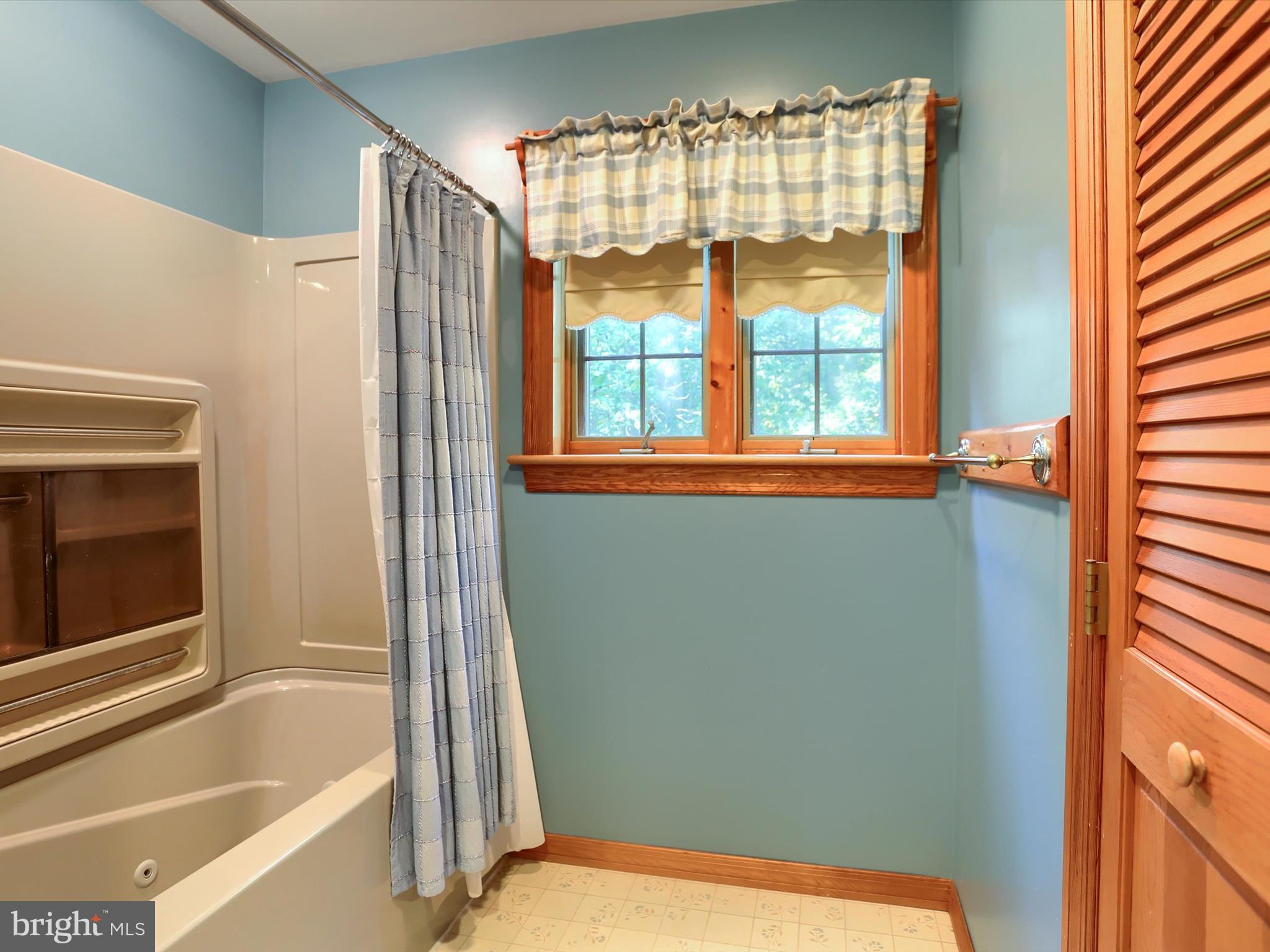 333 Mauger Path Road Port Royal, PA 17082 - Photo 35 of 58 a bathroom with a tub and a shower